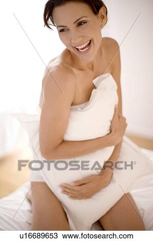 Stock Image - Laughing woman. Fotosearch