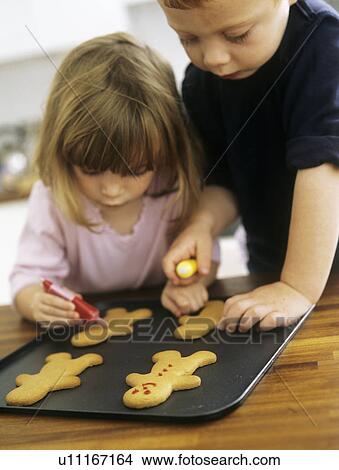 Picture - Making biscuits. Fotosearch