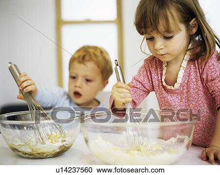 Stock Image - Making cakes. Fotosearch