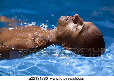 Stock Photography - Man floating. Fotosearch
