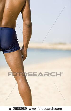Man on a beach View Large Photo Image Stock Photo - Man on a beach. Fotosearch