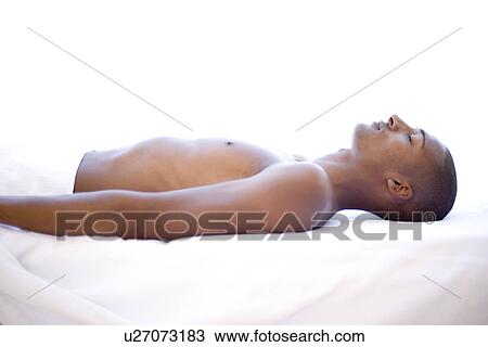 Stock Image - Man relaxing at a spa. Fotosearch
