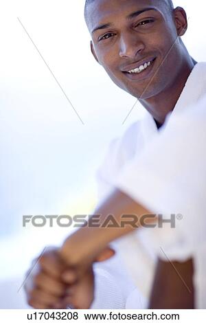Man relaxing at a spa View Large Photo Image Stock Photo - Man relaxing at a spa. Fotosearch