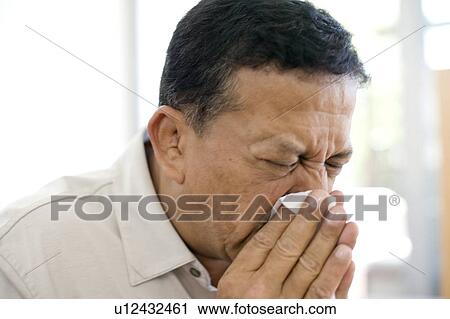 Man sneezing View Large Photo Image Stock Image - Man sneezing. Fotosearch
