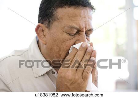 Man sneezing View Large Photo Image Stock Image - Man sneezing. Fotosearch