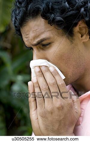 Man sneezing View Large Photo Image Stock Photography - Man sneezing. Fotosearch
