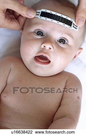 Measuring body temperature View Large Photo Image Stock Image - Measuring body temperature. Fotosearch