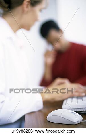 Stock Image - Medical consultation. Fotosearch