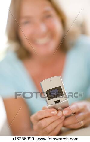 Mobile phone texting View Large Photo Image Stock Photo - Mobile phone texting. Fotosearch