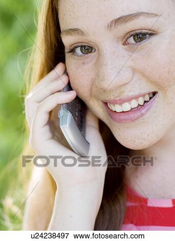 Stock Photo - Mobile phone use. Fotosearch