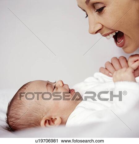 Stock Image - Mother and baby girl. Fotosearch