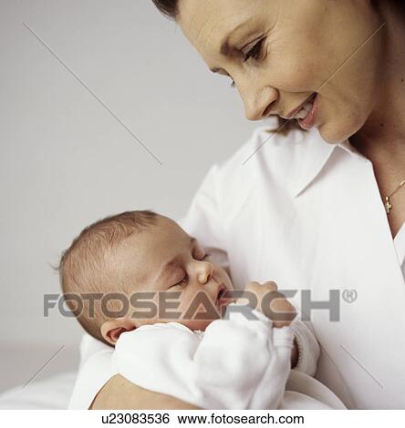 Mother and baby girl View Large Photo Image Stock Photograph - Mother and baby girl. Fotosearch