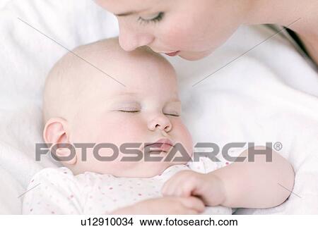 Mother and baby View Large Photo Image Picture - Mother and baby. Fotosearch
