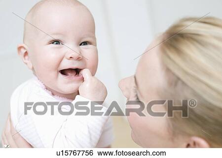 Mother and baby View Large Photo Image Stock Photograph - Mother and baby. Fotosearch