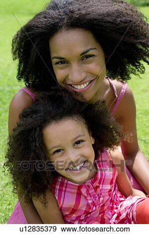 Mother and daughter View Large Photo Image Stock Photo - Mother and daughter. Fotosearch