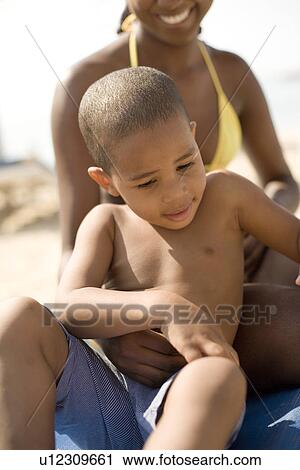 Stock Image - Mother and son on holiday. Fotosearch