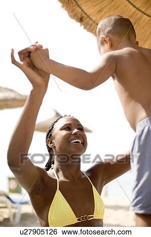 Stock Photograph - Mother and son playing. Fotosearch