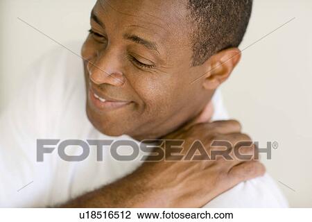 Stock Image - Neck pain. Fotosearch