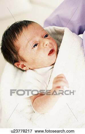 Newborn baby View Large Photo Image Stock Photo - Newborn baby. Fotosearch