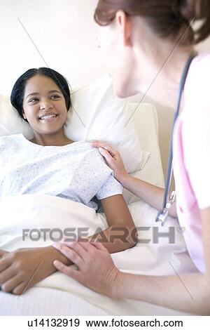Stock Photo - Nurse and patient. Fotosearch
