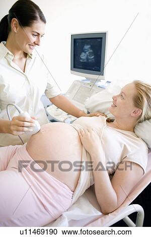 Stock Image - Obstetric ultrasound. Fotosearch