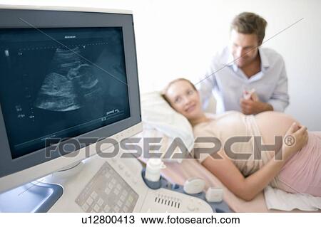 Stock Image - Obstetric ultrasound. Fotosearch