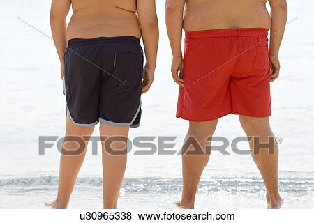 Overweight boy and man View Large Photo Image Stock Photo - Overweight boy and man. Fotosearch