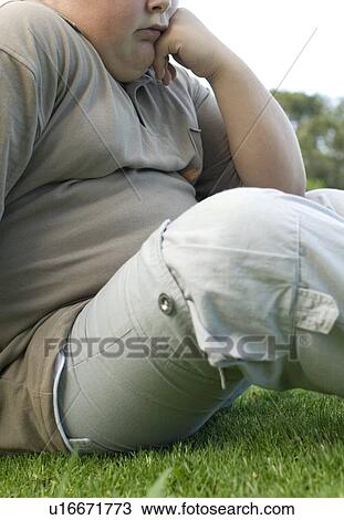 Stock Image - Overweight boy. Fotosearch