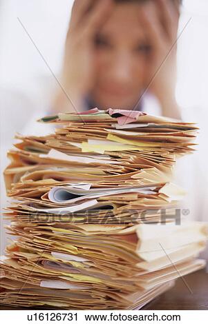 Stock Image - Overworked doctor. Fotosearch