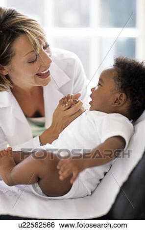 Paediatric examination View Large Photo Image Stock Photograph - Paediatric examination. Fotosearch