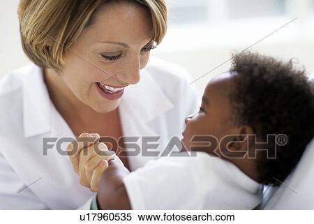 Stock Photography - Paediatric examination. Fotosearch
