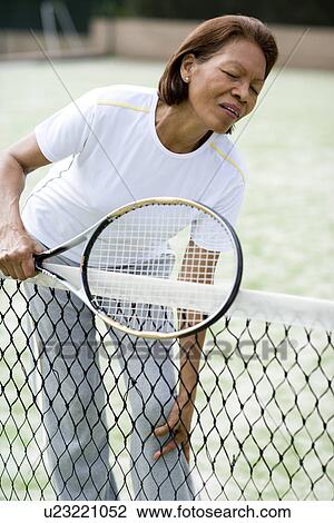 Stock Image - Painful knee injury. Fotosearch