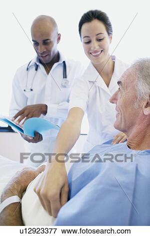 Stock Photo - Patient care. Fotosearch