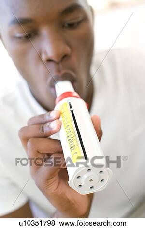 Peak flow meter use View Large Photo Image Stock Photo - Peak flow meter use. Fotosearch