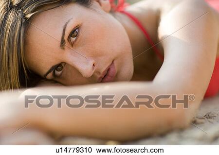 Stock Image - Pensive woman. Fotosearch