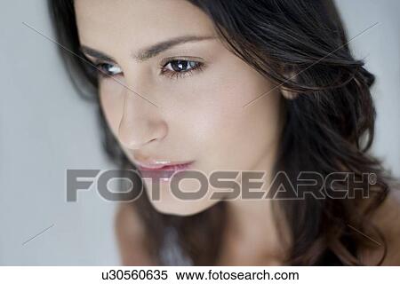 Stock Photography - Pensive woman. Fotosearch