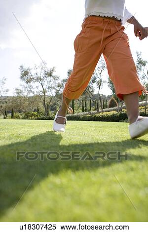 Stock Photography - Playing outdoors. Fotosearch