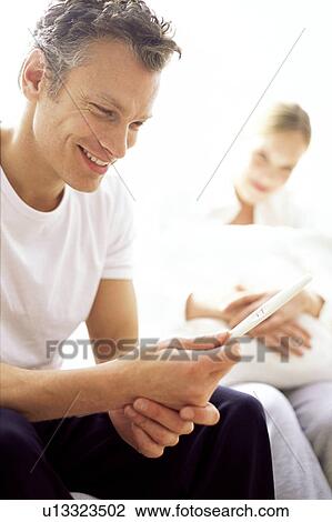 Stock Image - Positive pregnancy test. Fotosearch