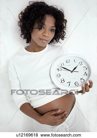 Pregnancy timings View Large Photo Image Stock Photo - Pregnancy timings. Fotosearch