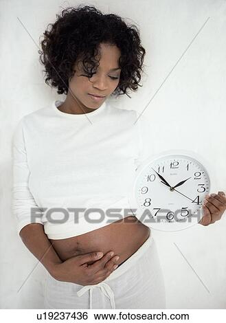 Pregnancy timings View Large Photo Image Stock Photograph - Pregnancy timings. Fotosearch