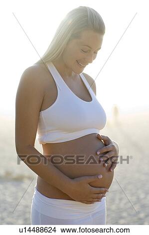 Picture - Pregnant woman. Fotosearch