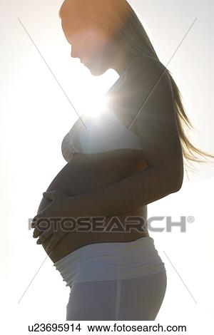 Picture - Pregnant woman. Fotosearch
