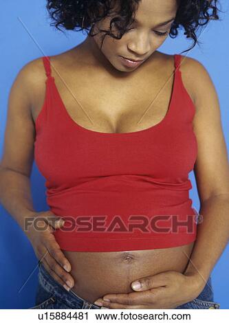 Stock Image - Pregnant woman. Fotosearch