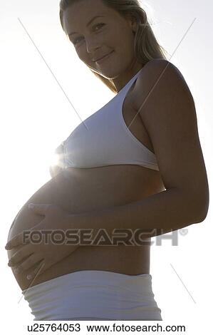 Stock Image - Pregnant woman. Fotosearch