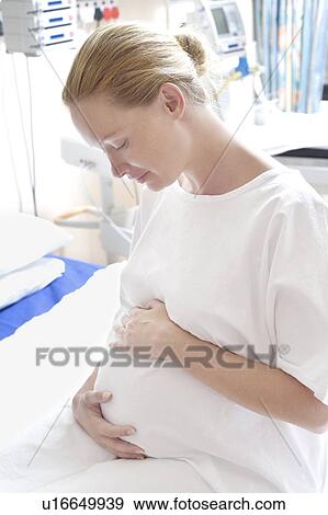 Stock Photo - Pregnant woman. Fotosearch