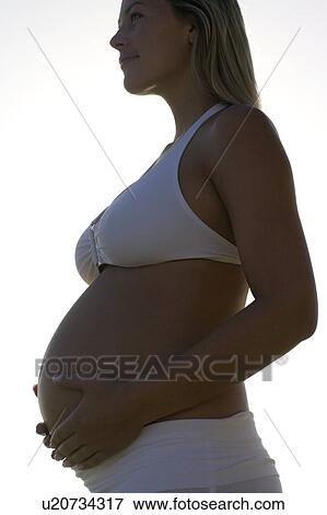 Stock Photo - Pregnant woman. Fotosearch