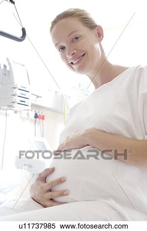 Stock Photography - Pregnant woman. Fotosearch