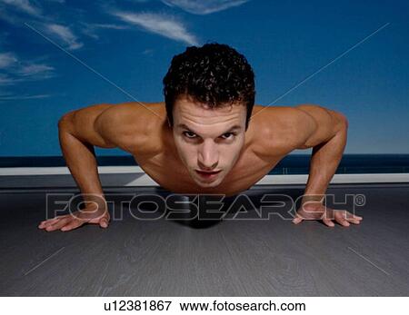 Stock Photo - Press-up exercises. Fotosearch