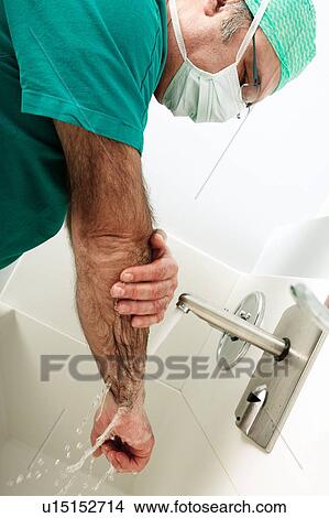 Scrubbing up before surgery View Large Photo Image Picture - Scrubbing up before surgery. Fotosearch