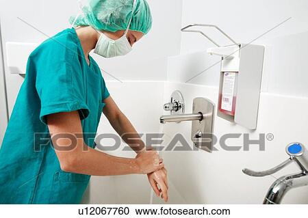 Scrubbing up before surgery View Large Photo Image Stock Image - Scrubbing up before surgery. Fotosearch